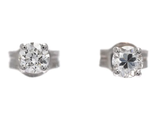 ENSTENSÖRHÄNGEN, 18K vitguld, 2 mediumslipade diamanter ca 0,32 ctv, ca W-TCa/VS, stift, vikt 0,8 g.