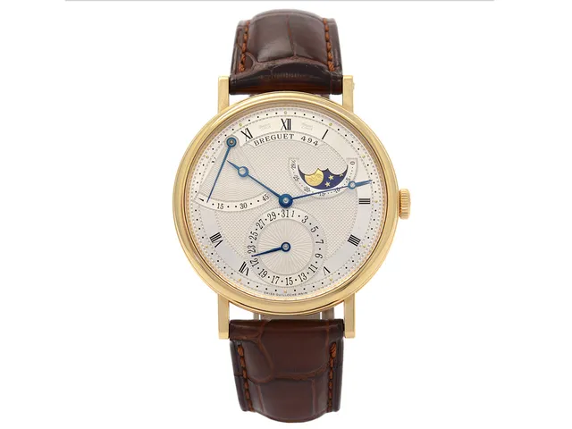 BREGUET, Classique, Cal 502.3.DR1, Serie nr. 41987, Ref nr. 7137BA119V6, Boett nr. 494 AJ, herrur, 39,5 mm, 18K guld, automatisk, safirglas, dag, datum, månfas, gångreservindikator, glasbaksida, läderband, viklås i 18K guld, ställpinne, cert, december 2009, box, ytterkartong.