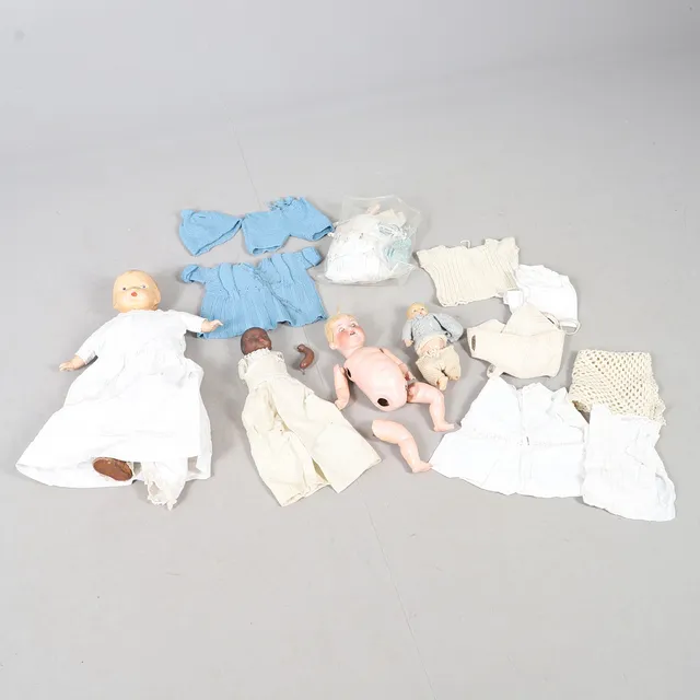 TWO ARMAND MARSEILLE GERMAN BISQUE HEADED DOLLS, AND TWO OTHERS.