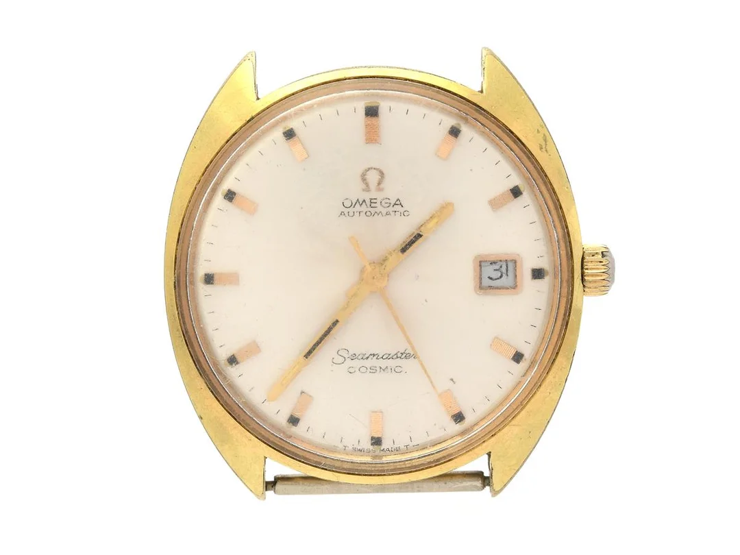 OMEGA, Seamaster, Cosmic (-T Swiss Made T-), Cal 565, Serie nr. 26920555, Ref nr. MD 166.0026, Boett nr. 166.026, herrur, 35 mm, doublé (skadad, 20 micron), automatisk, plexiglas, datum, skadad urtavla, defekt (går ej, akut servicebehov), ca 1968. — Klockor/Omega — Kaplans
