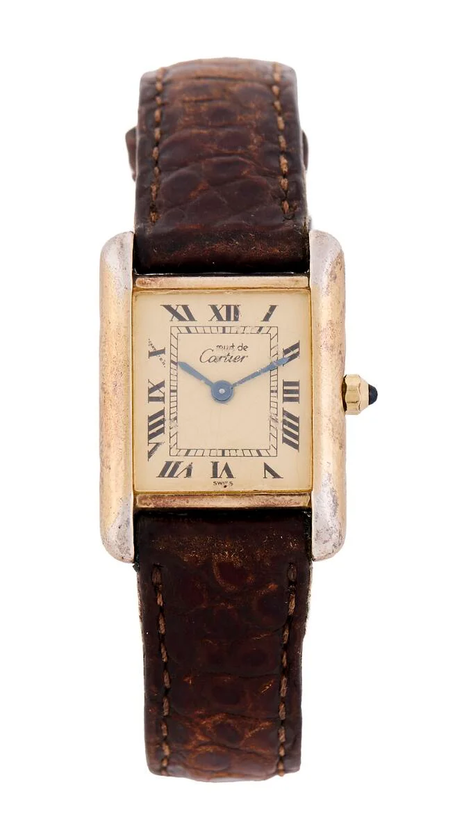 Tank Vermeil of gilded silver, ref. 366001. Quartz movement. Brown strap with Cartier C-clasp of gilded metal. Ø 21×28 mm. 1980s. — Clocks & watches/Wristwatches — Bruun Rasmussen
