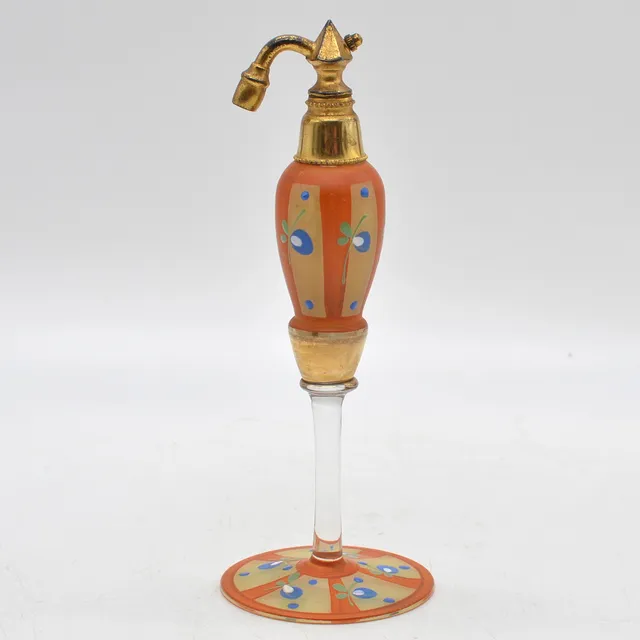 ANTIKER PARFÜMZERSTRÄUBER AUS FRANKREICH, ART DECO, GLAS UND MESSING, EMAILLE- UND GOLDDEKOR, UM 1920.