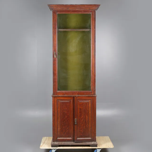 A LATE 19TH CENTURY ARMY & NAVY C.S.L OAK AND GLAZED GUN CABINET.