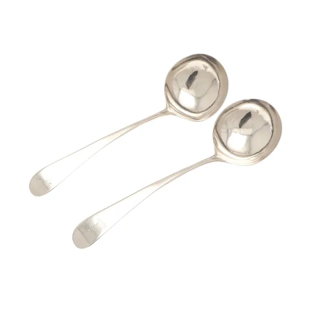 A PAIR OF GEORGE III SILVER OLD ENGLISH PATTERN SAUCE LADLES.