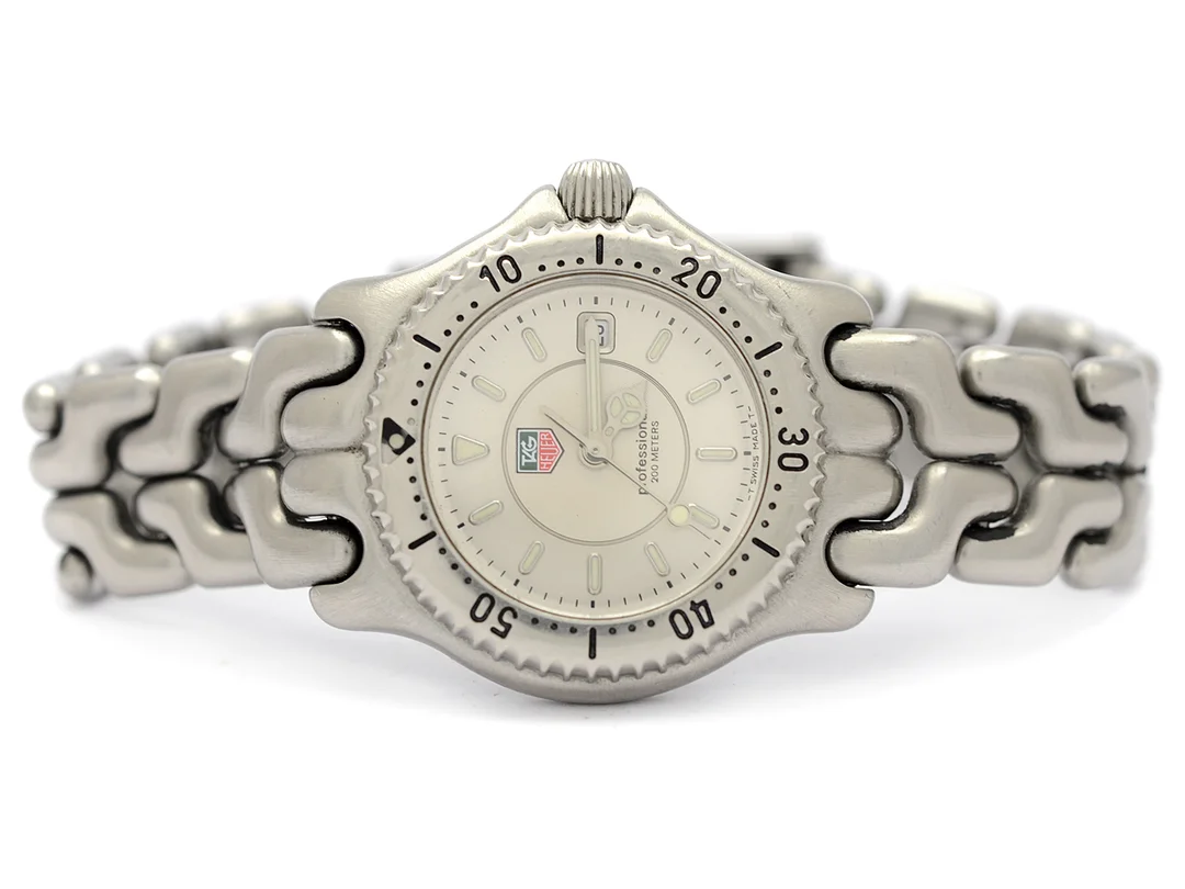 TAG HEUER, Professional (200 meters), S/el, Serie nr. BU7567, Ref nr. WG 131B, damur, 27,5 mm, stål, quartz, safirglas, datum, integrerad originallänk, viklås, Ref nr. BA0468-MO-E1, ca 1998, box, ytterkartong. — Klockor/Tag Heuer — Kaplans