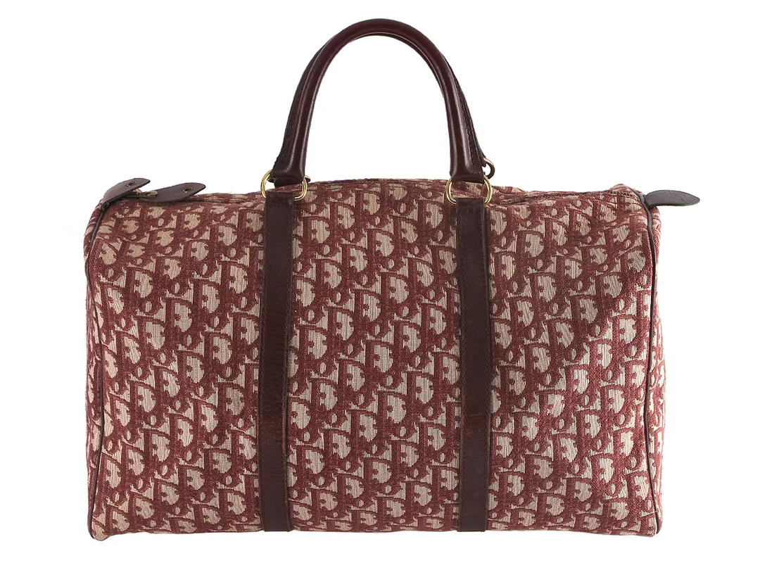 VÄSKA, CHRISTIAN DIOR, vintage, Monogram, vinrött läder, tyg med monogram, 40x22x18cm. — Accessoarer/Väskor — Kaplans