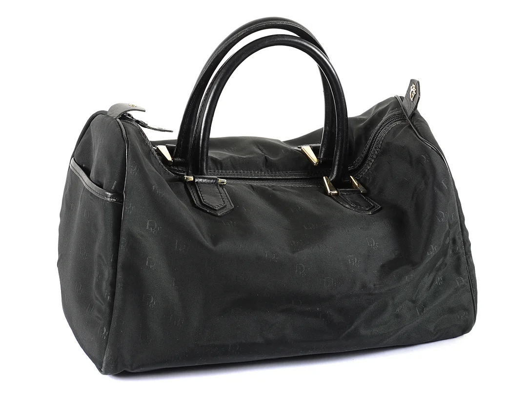 BAG, CHRISTIAN DIOR, vintage, svart nylon, svart läder, 36x23x18 cm. — Accessoarer/Väskor — Kaplans