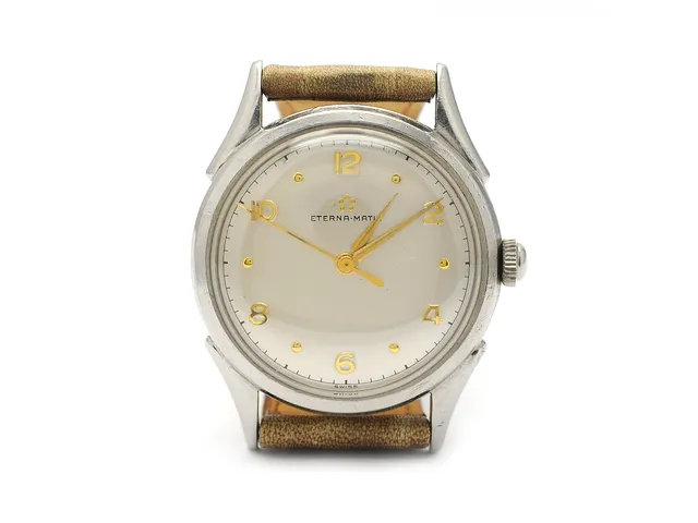 ETERNA-MATIC, herrur, 33 mm, Cal ETA 1256, Boett nr. 210907, stål, automatisk, plexiglas, skadad urtavla, läderband, ca 1953.