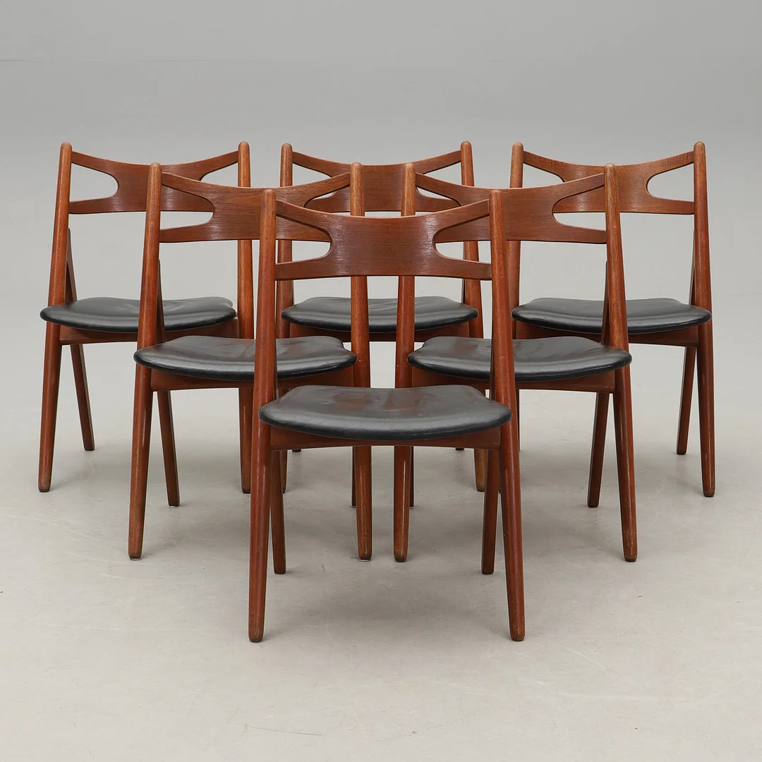 HANS J WEGNER. 6 st, stolar, teak, modell CH29, "Savbukkestolen", Carl Hansen & Søn, Odense, Danmark. — Armchairs & Chairs — Crafoord Auktioner Malmö