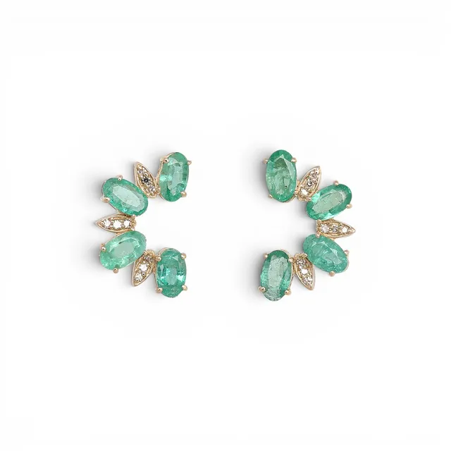 Emeralds and diamonds earrings.