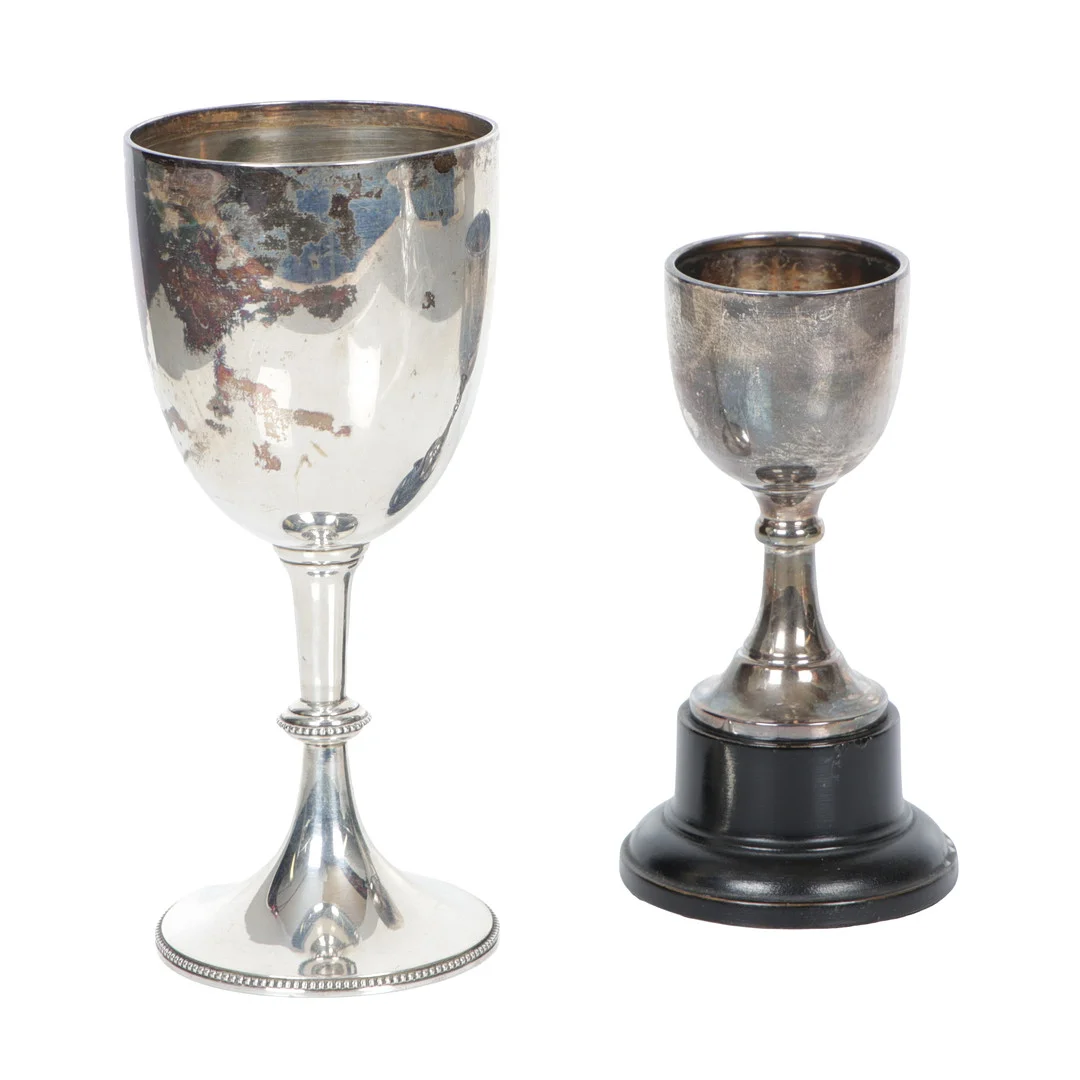 A VICTORIAN & A GEORGE V SILVER TROPHY CUP (2). — Silver — Bishop & Miller