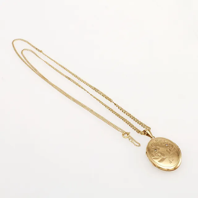 FOTOGÖMMA samt HALSKEDJA, 18 K guld. Ceson. Vikt 12 gram.