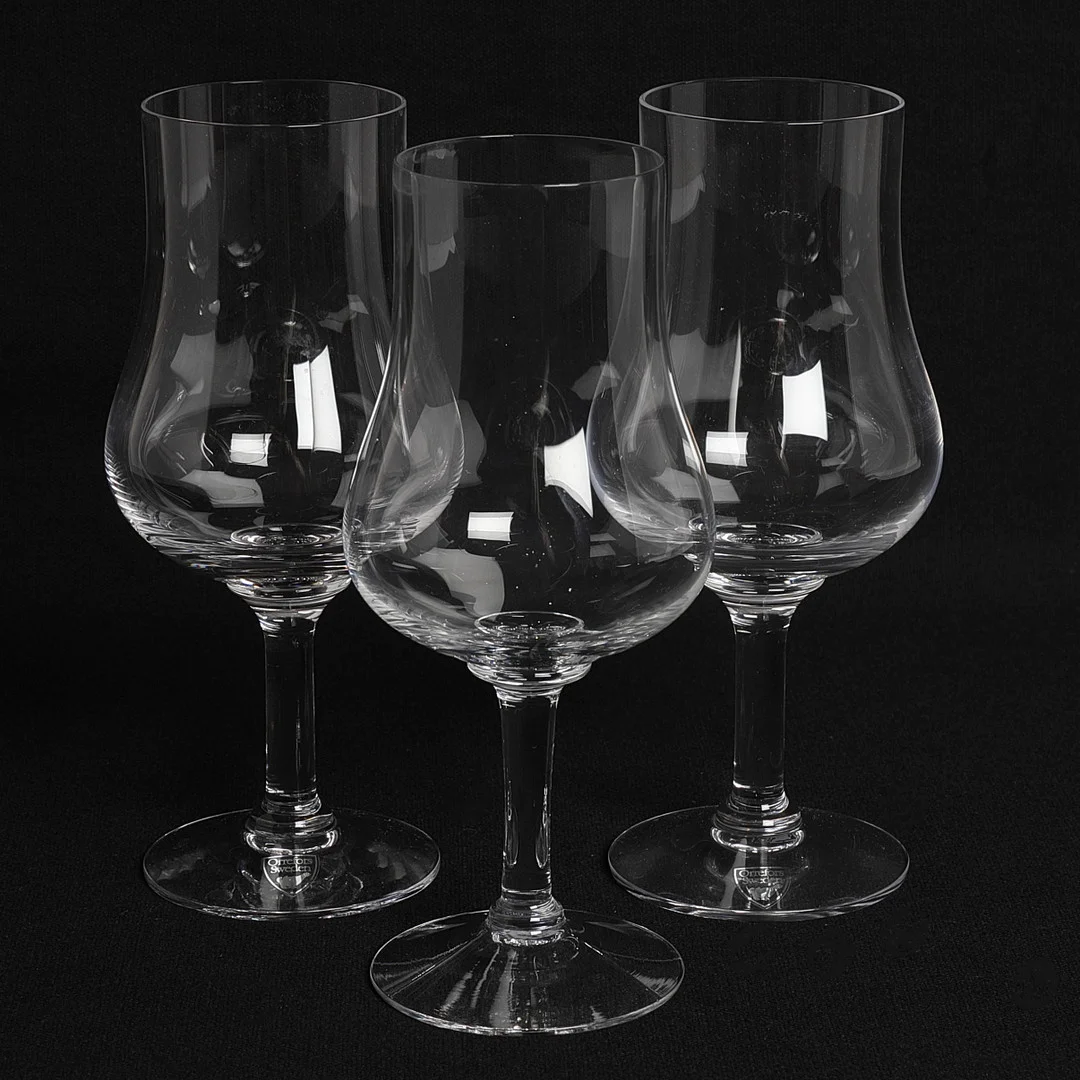 GUNNAR CYRÉN. ''Elixir'' vinprovarglas, 12 st, klar glasmassa, Orrefors. — Tableware — Crafoord Auktioner Stockholm