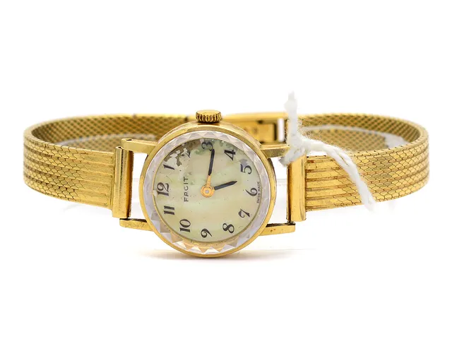 Damur Facit 18K manuell med skadad länk 18K 17cm, bruttovikt 30,5g, skadad urtavla, repig boett