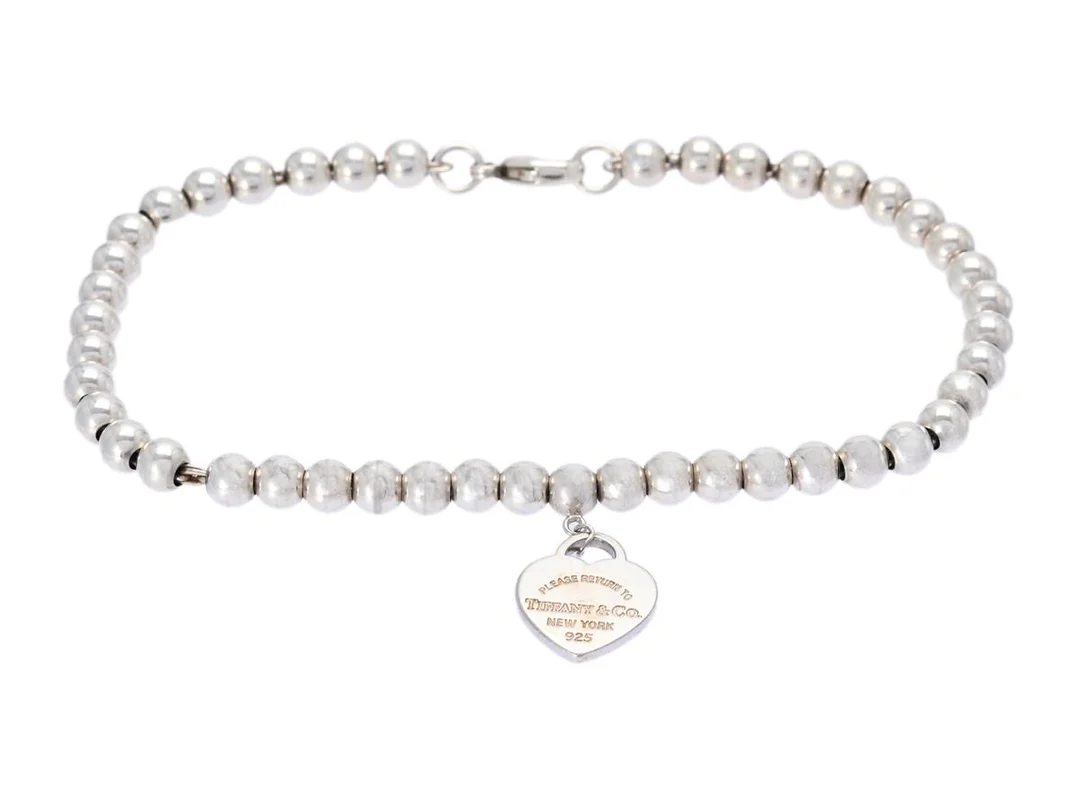 TIFFANY & CO, armband, Please return to, sterlingsilver, längd 18 cm, vikt 6,1 g, smyckespåse, originaletui, påse. — Smycken/Armband — Kaplans