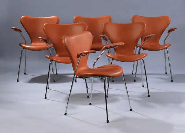 Arne Jacobsen. A set of six 'Syveren' armchairs, model 3207, cognac colored aniline leather. (6)