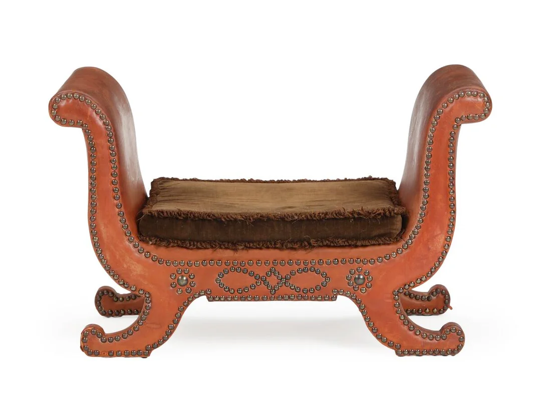 A stool upholstered with cognac coloured leather, fitted with brass nails, loose cushions with brown velour. 1930s. — Modern Furniture — Bruun Rasmussen