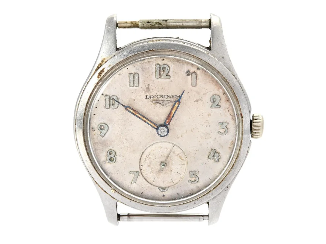 LONGINES, herrur, 35 mm, Cal 12.68Z, Serie nr. 10651413, Boett nr. 6263 17 / 53, stål, manuell, plexiglas, liten sekundvisare, skadad urtavla, defekt, skadad krona/ställaxel, ca 1957. — Klockor/Longines — Kaplans
