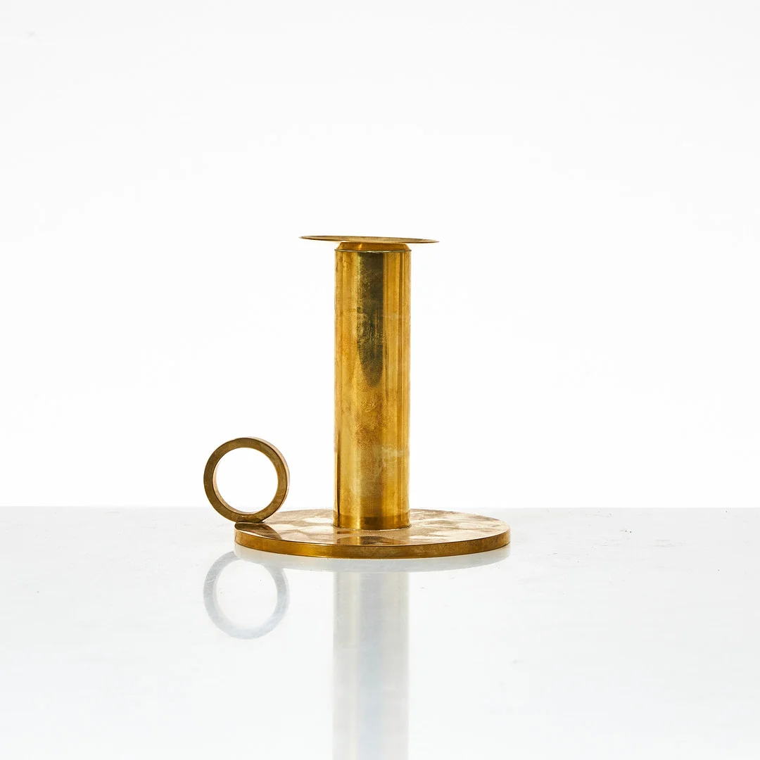 SIGURD PERSSON. " Kammarljusstake", mässing, stämplad Sig. P. — Candlesticks — Stockholms Auktionsverk Magasin 5