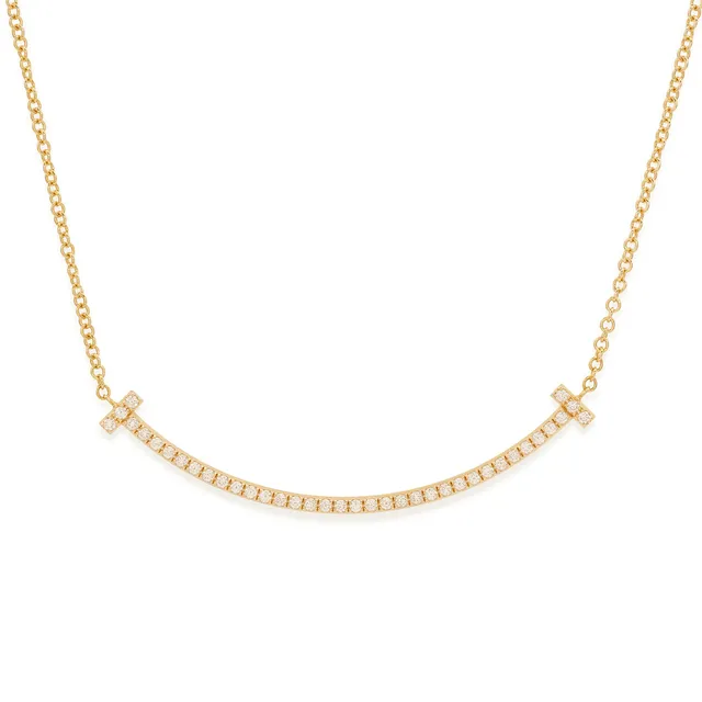 TIFFANY & CO. Tiffany T collection, 'T Smile small ' halskæde af 18 kt guld med diamanter. 0,10 ct.