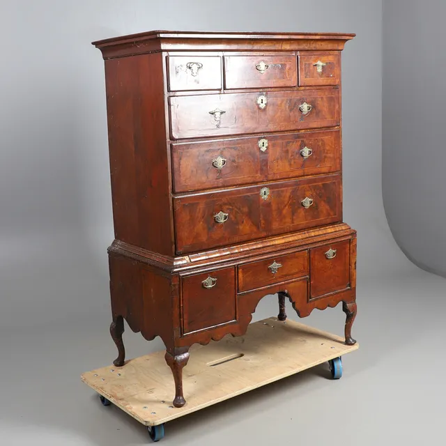 AN 18TH CENTURY WALNUT CHEST ON STAND.
