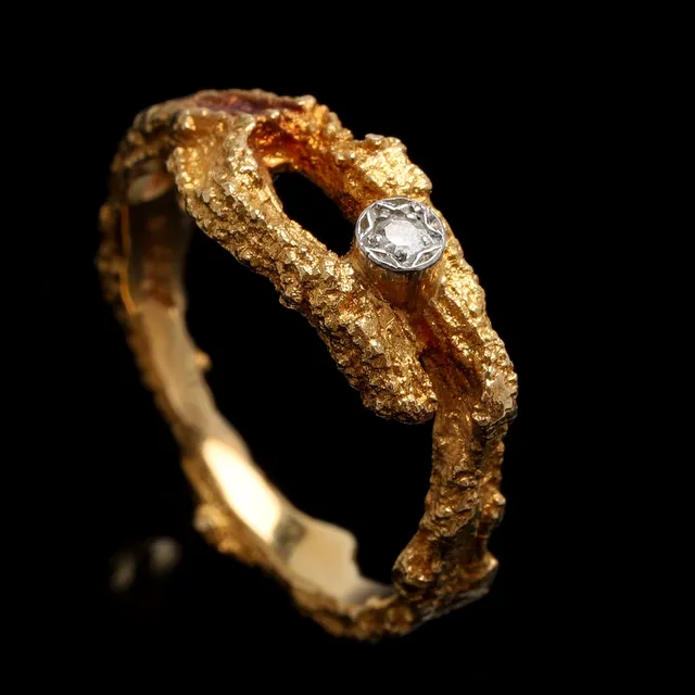BJÖRN WECKSTRÖM. RING, 18k guld. "Diamantdamm", diamant, ca 0,02 ct. Lapponia, 1970. Vikt ca 3,6 gram.