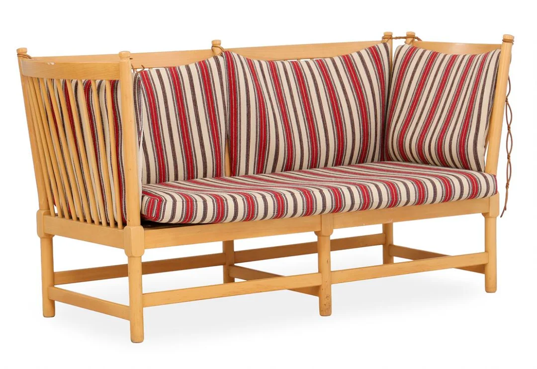 “The spoke-back sofa”. Two-seater sofa with beech frame, flip-down side. Sides, seat and back with loose cushions upholstered with striped wool. Model 1789. Designed 1945. Manufactured by Fritz Hansen. L. 160 cm. — Modern Furniture — Bruun Rasmussen