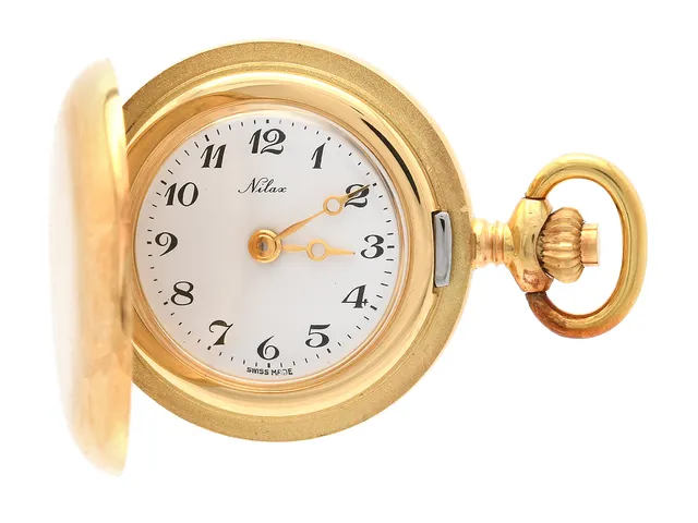 NILAX, mormorsur, 25 mm, Cal ETA 2512-1, Boett nr. 9703, 18K guld, savonett, ankargång, ca 1980.