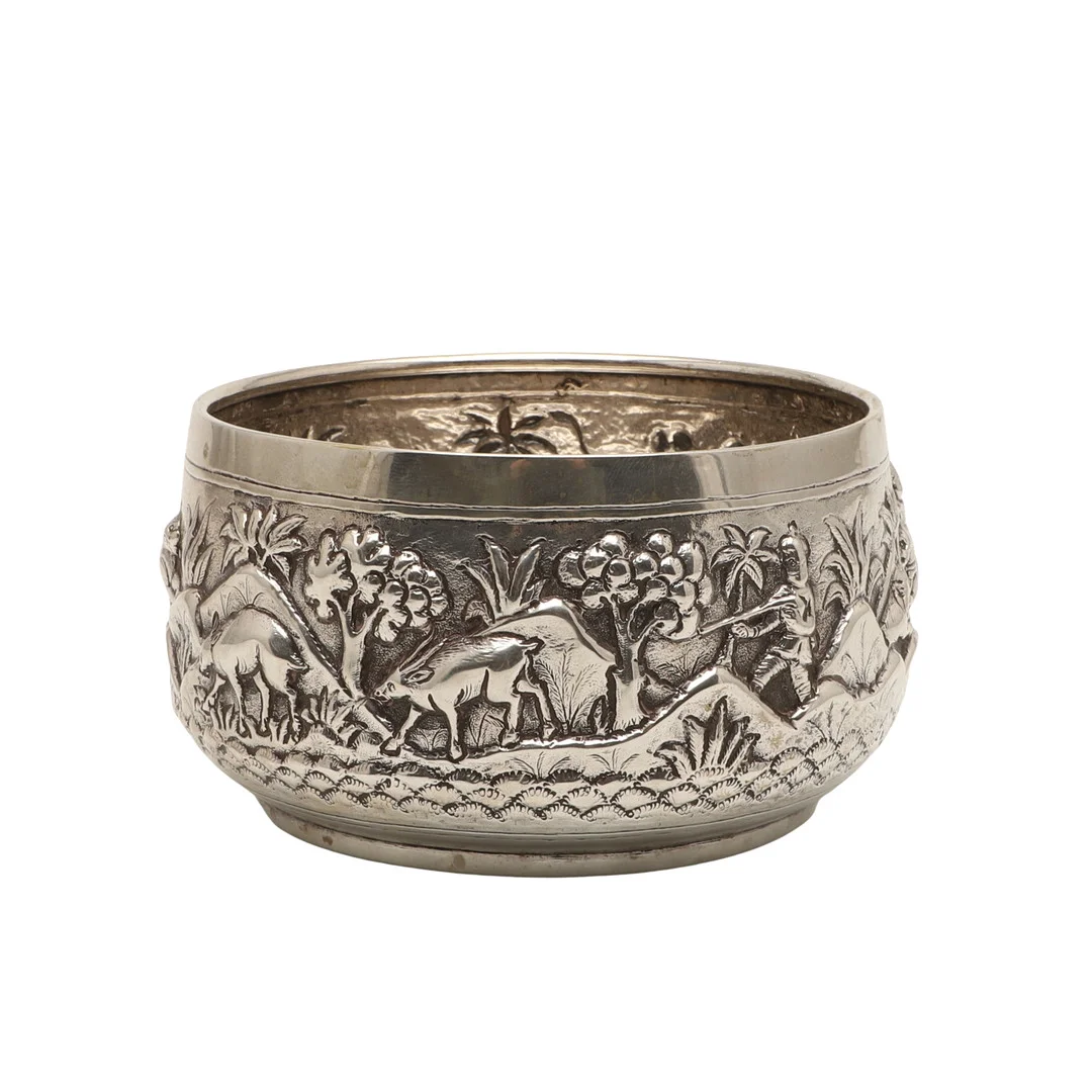 AN INDIAN/BURMESE WHITE METAL BOWL. — Silver — Lawrences Auctioneers