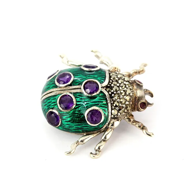AMETHYST AND ENAMEL LADYBIRD BROOCH.