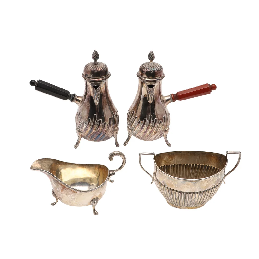 A SILVER SUGAR BOWL & SAUCE BOAT. — Silver — Lawrences Auctioneers