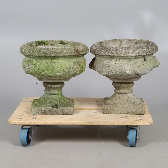 PAIR OF COMPOSITE LION MASK URNS.
