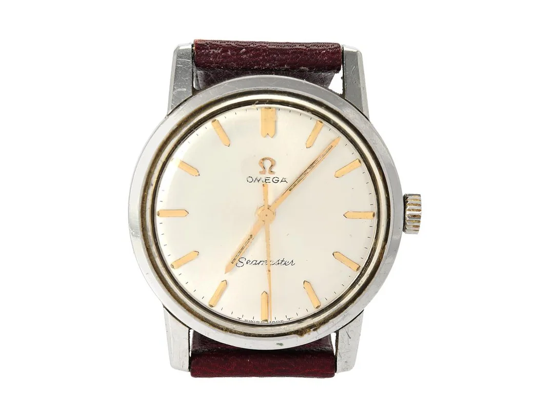 OMEGA, Seamaster (T Swiss Made T), Cal 600, Serie nr. 21206923, Ref nr. ST 135.005, Boett nr. 135.005 (LL), herrur, 33,5 mm, stål, manuell, plexiglas, skadad urtavla/visare, läderband, ca 1964. — Klockor/Omega — Kaplans
