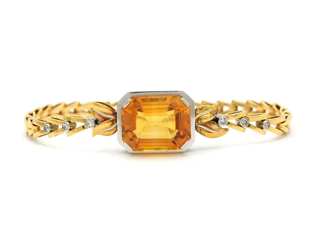 ARMBAND, 18K vitguld/guld, citrin, 6 åttkantslipade diamanter ca 0,12 ctv, ca W/SI, Carlman Stockholm 1935, senare länk Stockholm 1951, längd 16 cm, vikt 16,9 g.