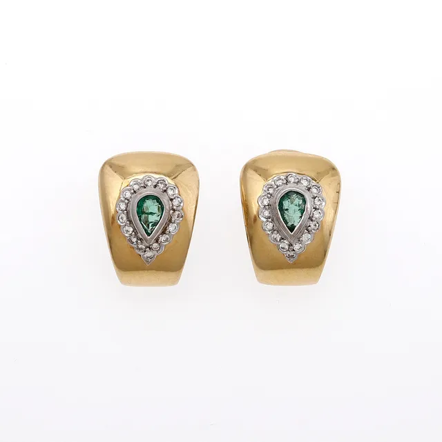 Emeralds and diamonds earrings, circa 1980.