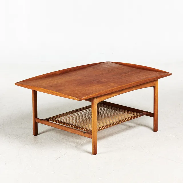 FOLKE OHLSSON. Soffbord "Frisco", för Dux, 1960-tal, teak, underhylla av flätad rotting, märkt undertill.