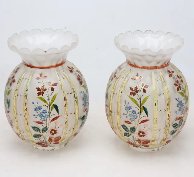 Pair of probably French globes in moulded, matted and enamelled glass, late 19th Century.