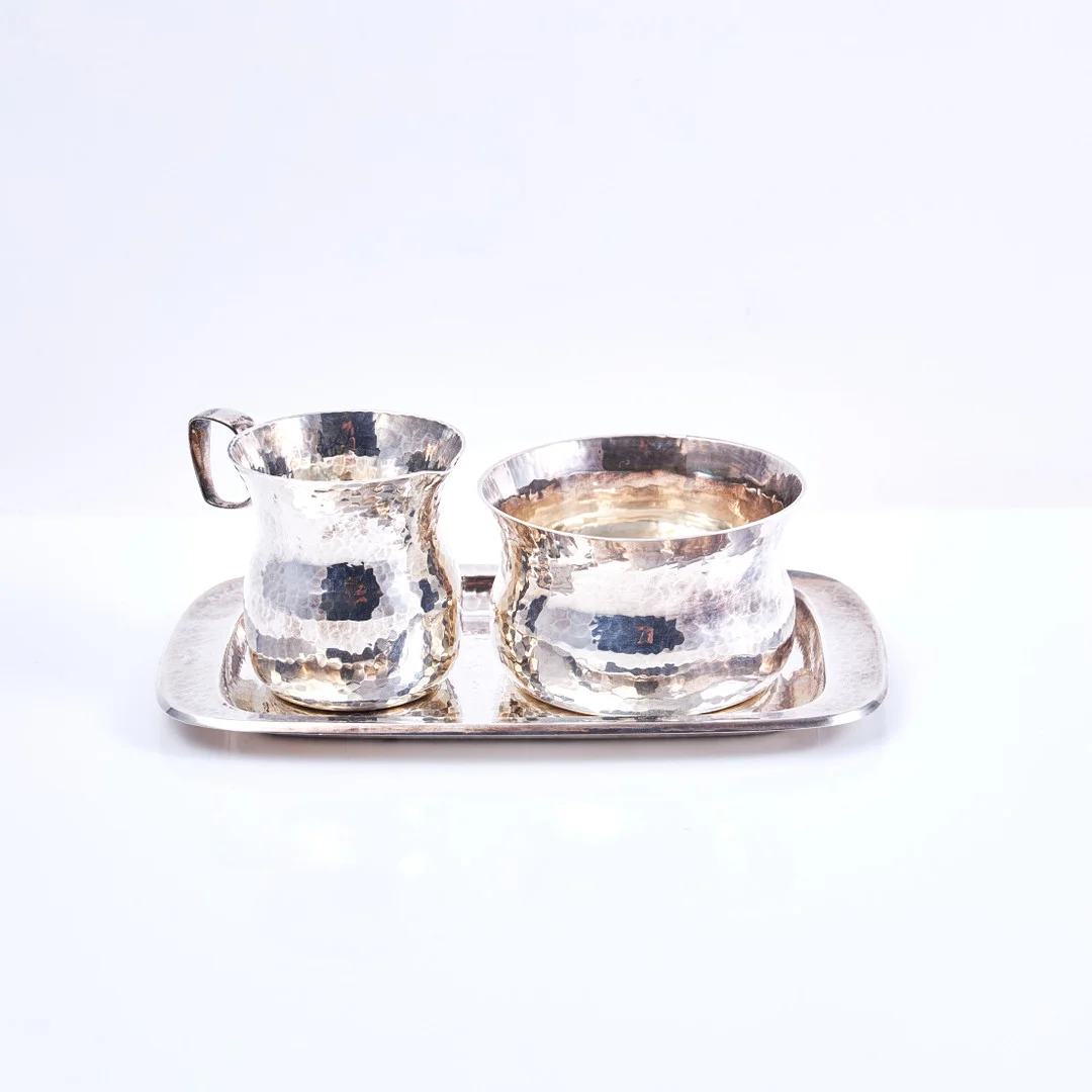 ERIC LÖFMAN. 3 dlr. silver, handarbete, för MGAB, 1976. — Silver — Stockholms Auktionsverk Sickla