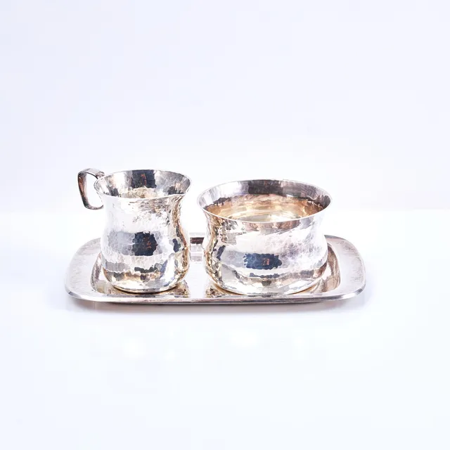 ERIC LÖFMAN. 3 dlr. silver, handarbete, för MGAB, 1976.