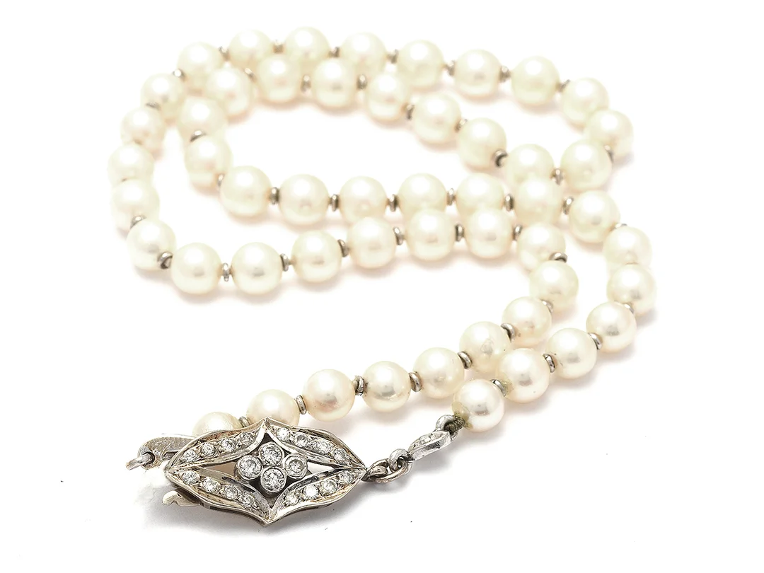 Pärlcollier Ø5,7mm 39cm 14K lås med diamanter 4xca0,03-0,04ct och 16xca0,01ct — Smycken/Pärlcollier — Kaplans