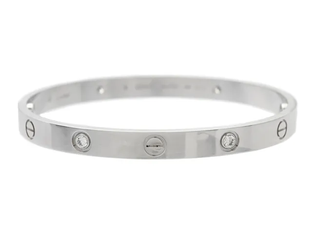 CARTIER, armband, Love, 18K vitguld, 4 briljantslipade diamanter 0,42 ct, serie nr. IQG527, stl 18, vikt 34,7 g, skruvmejsel, certifikat, originaletui.