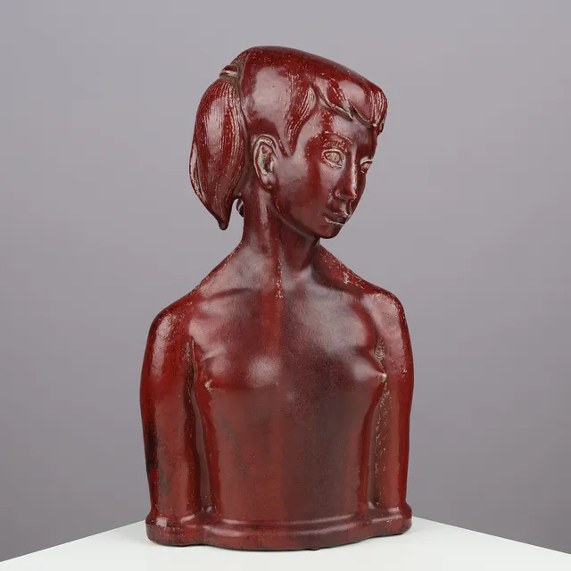HELGE CHRISTOFFERSEN (1925-65). Unique stoneware sculpture depicting a nude, young female figure covered in oxblood glaze, Royal Copenhagen, Denmark, 1940s/50s.