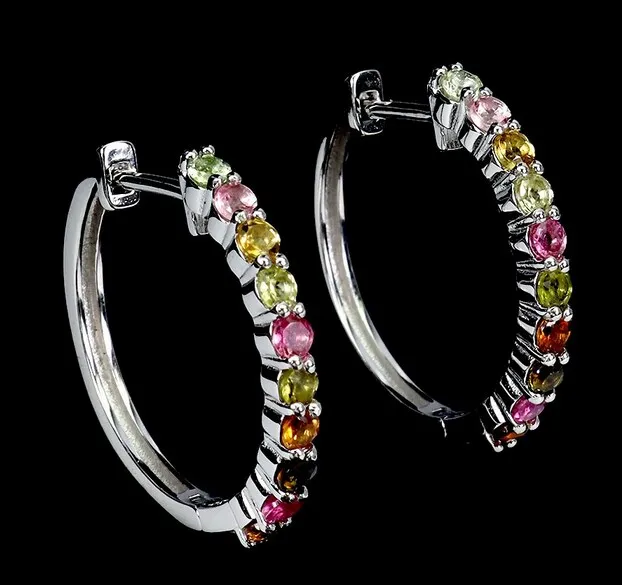 Earrings in rhodium-plated sterling silver adorned with numerous 2 mm multicolored tourmalines.