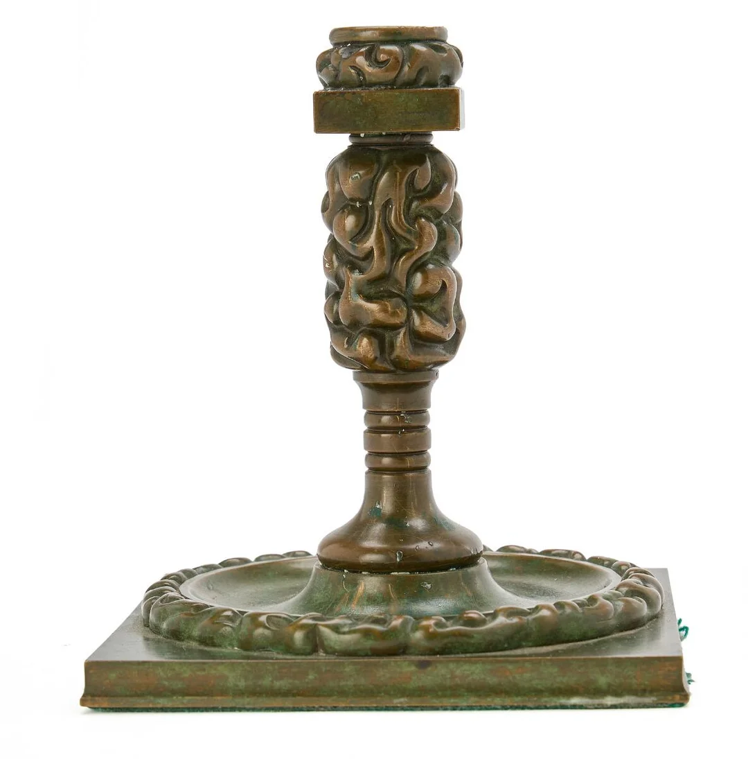 A patinated bronze Art Nouveau candlestick with stylised stem. Unmarked. H. 16.5 cm. W./L. 14.5 cm. — Modern Decorative Art — Bruun Rasmussen