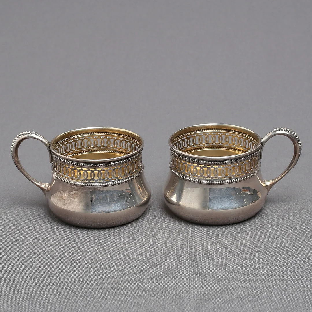 GLASHÅLLARE 1 par, silver, svensk import, 1900-tal. — Silver — Auktionshuset Kolonn