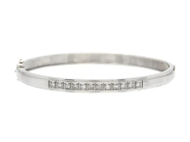 ARMBAND, 18K vitguld, åttkantslipade diamanter ca 0,36 ctv, ca W-TCr/SI, Ceson, Göteborg 1967, mått 5,4x 6,3 cm, vikt 14,5 g, en diamant har skada.