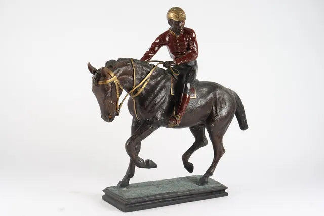 Skulptur af bronze. 'Jockey til hest'