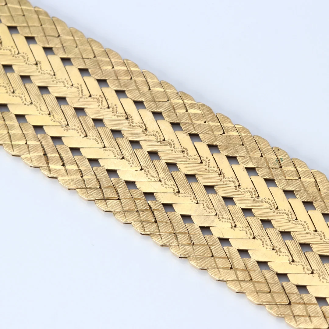 ARMBAND. 18k guld, guldsmed Gino Marchiori, Vicenza, Italien, vikt ca 66,5 gram. — Bracelets — Skånes Auktionsverk