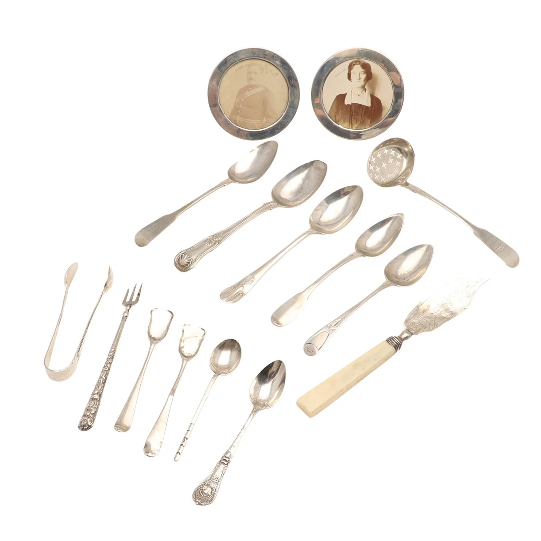 TWO SMALL SILVER PHOTOGRAPH FRAMES & VARIOUS CUTLERY. — Silver — Lawrences Auctioneers
