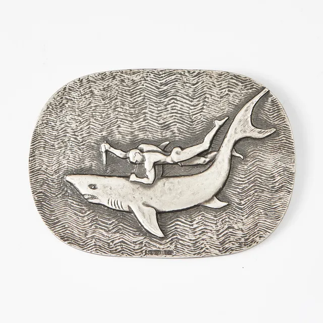 STIG BLOMBERG. "Hajdödaren", plakett, metall, stämpelmärkt.